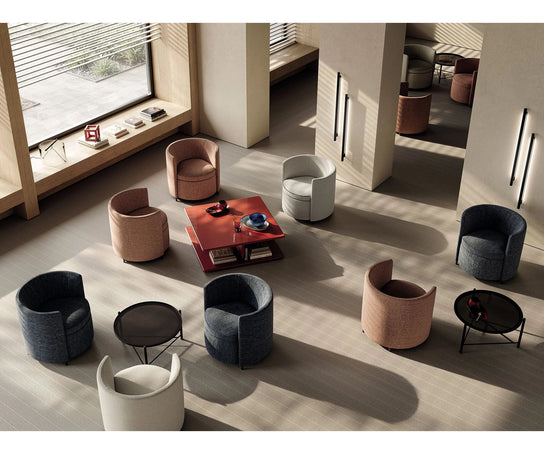 Lou Armchair by Frigerio featuring a contemporary tub silhouette, premium upholstery, and elegant Italian craftsmanship | Casa Design Group