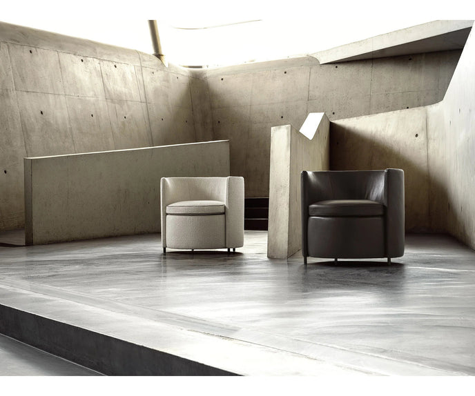Lou Armchair by Frigerio featuring a contemporary tub silhouette, premium upholstery, and elegant Italian craftsmanship | Casa Design Group