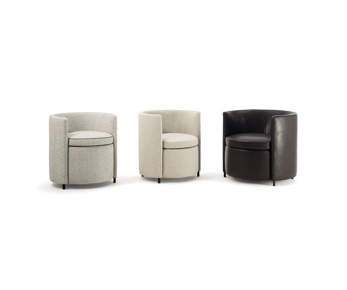 Lou Armchair by Frigerio featuring a contemporary tub silhouette, premium upholstery, and elegant Italian craftsmanship | Casa Design Group