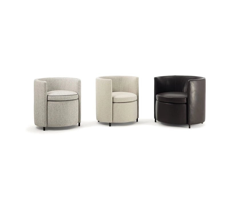Lou Armchair by Frigerio featuring a contemporary tub silhouette, premium upholstery, and elegant Italian craftsmanship | Casa Design Group