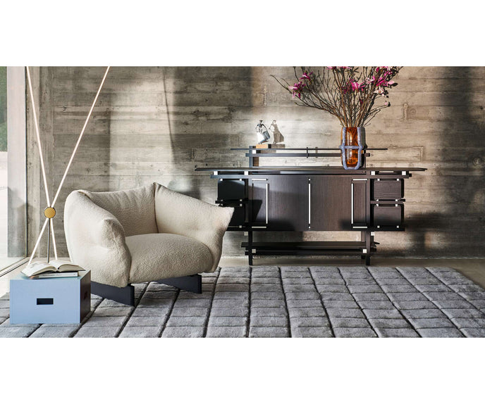 Mon-Cloud Lounge Chair by Cassina designed by Patricia Urquiola with a sculptural upholstered form and wooden base.