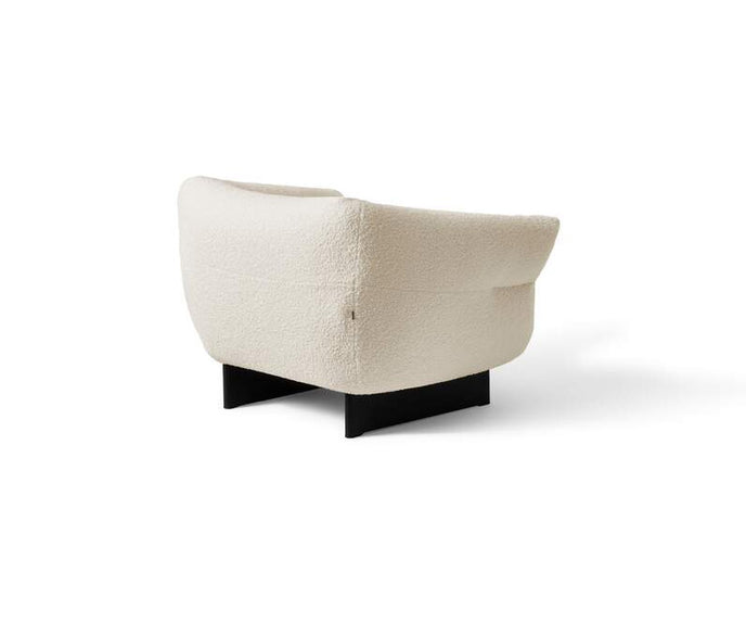 Mon-Cloud Lounge Chair by Cassina designed by Patricia Urquiola with a sculptural upholstered form and wooden base.