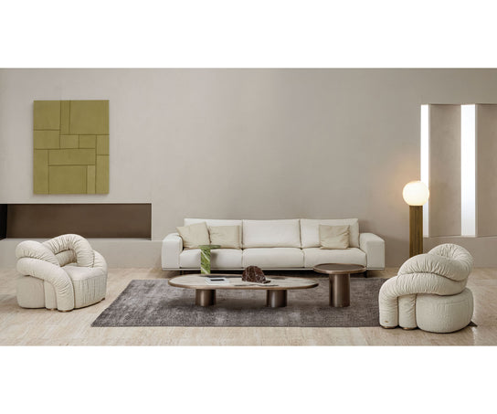 Monaco coffee table by Rugiano with a hand-hammered bronze base and sculptural top.