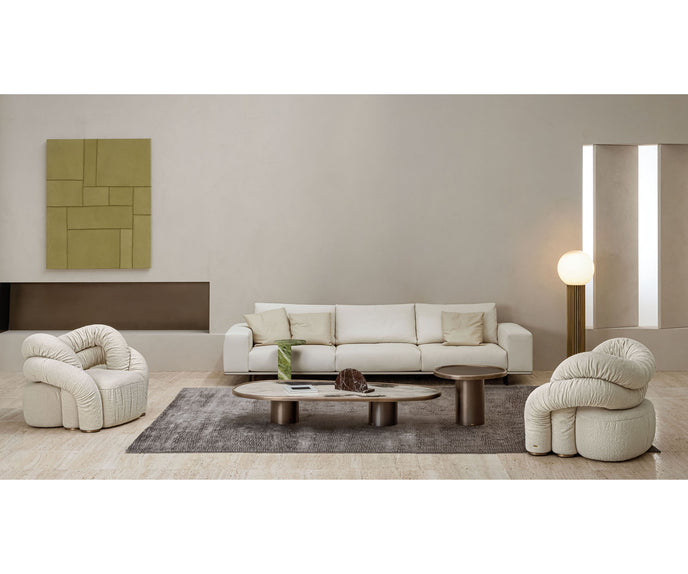 Monaco coffee table by Rugiano with a hand-hammered bronze base and sculptural top.