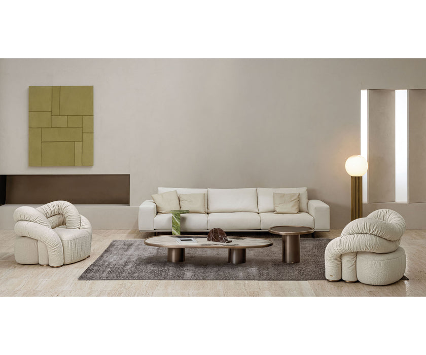 Monaco coffee table by Rugiano with a hand-hammered bronze base and sculptural top.