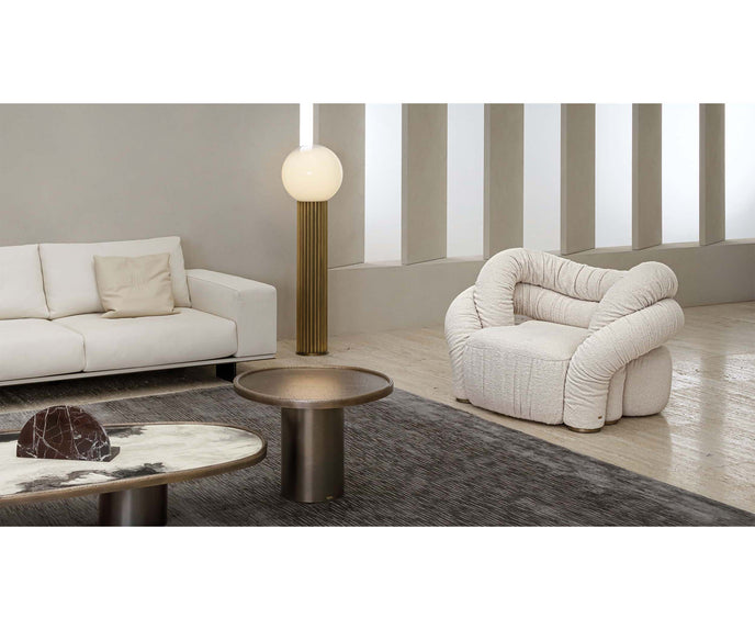 Monaco coffee table by Rugiano with a hand-hammered bronze base and sculptural top.