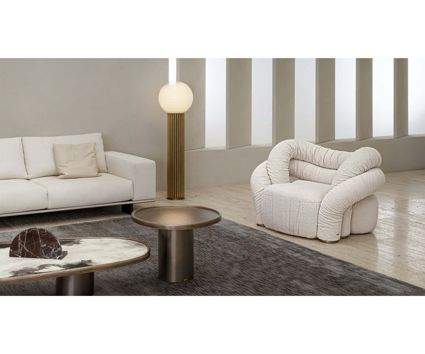 Monaco coffee table by Rugiano with a hand-hammered bronze base and sculptural top.