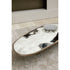 Monaco coffee table by Rugiano with a hand-hammered bronze base and sculptural top.