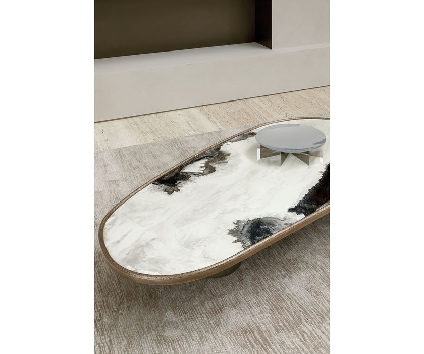 Monaco coffee table by Rugiano with a hand-hammered bronze base and sculptural top.