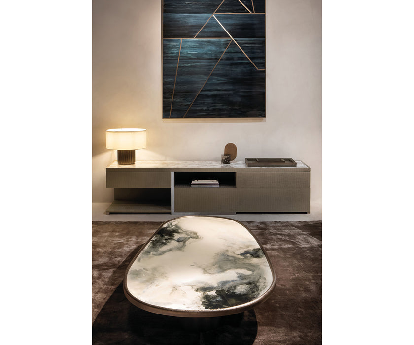 Monaco coffee table by Rugiano with a hand-hammered bronze base and sculptural top.