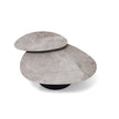 Move Coffee Table by Draenert with rotating natural stone tops and a conical metal base.