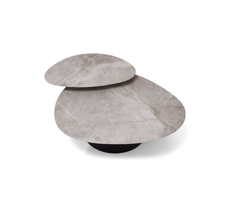 Move Coffee Table by Draenert with rotating natural stone tops and a conical metal base.