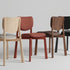 Naqi Dining Chair with solid wood frame and interchangeable upholstered seat by Skram | Casa Design Group