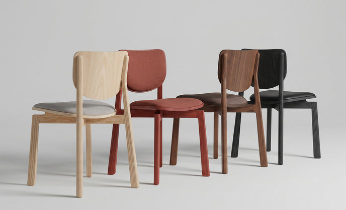 Naqi Dining Chair with solid wood frame and interchangeable upholstered seat by Skram | Casa Design Group
