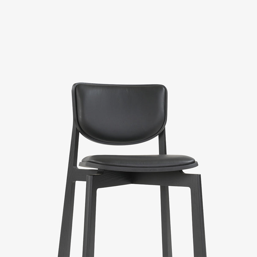 Naqi Dining Chair with solid wood frame and interchangeable upholstered seat by Skram | Casa Design Group