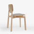 Naqi Dining Chair with solid wood frame and interchangeable upholstered seat by Skram | Casa Design Group