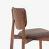 Naqi Dining Chair with solid wood frame and interchangeable upholstered seat by Skram | Casa Design Group