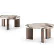Noah organic coffee table by Rugiano with a sculptural stone top and minimalist base.