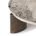 Noah organic coffee table by Rugiano with a sculptural stone top and minimalist base.