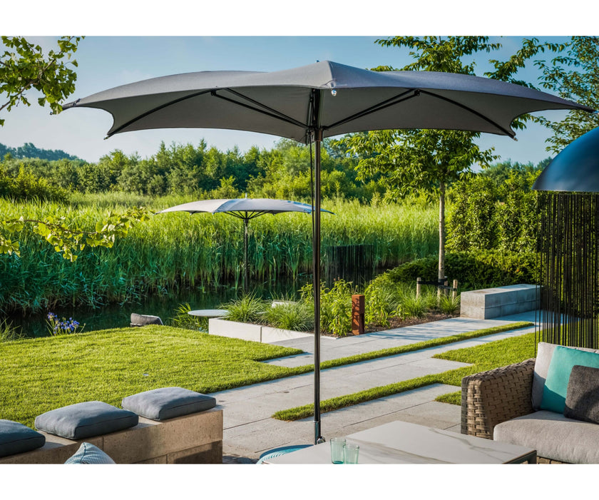Modern Tuuci Ocean Master M1 Crescent Umbrella, polished rib details and elegant canopy – Casa Design Group