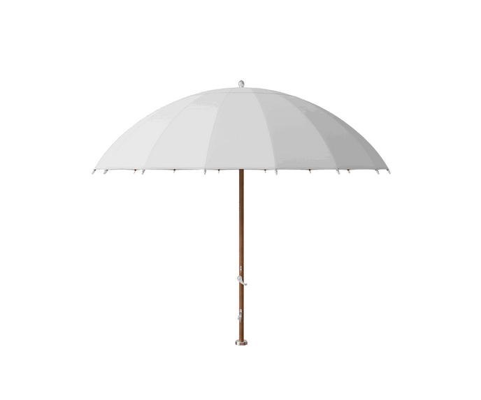 Modern outdoor Bolero parasol by Tuuci featuring curved ribs and titanium mast – Casa Design Group