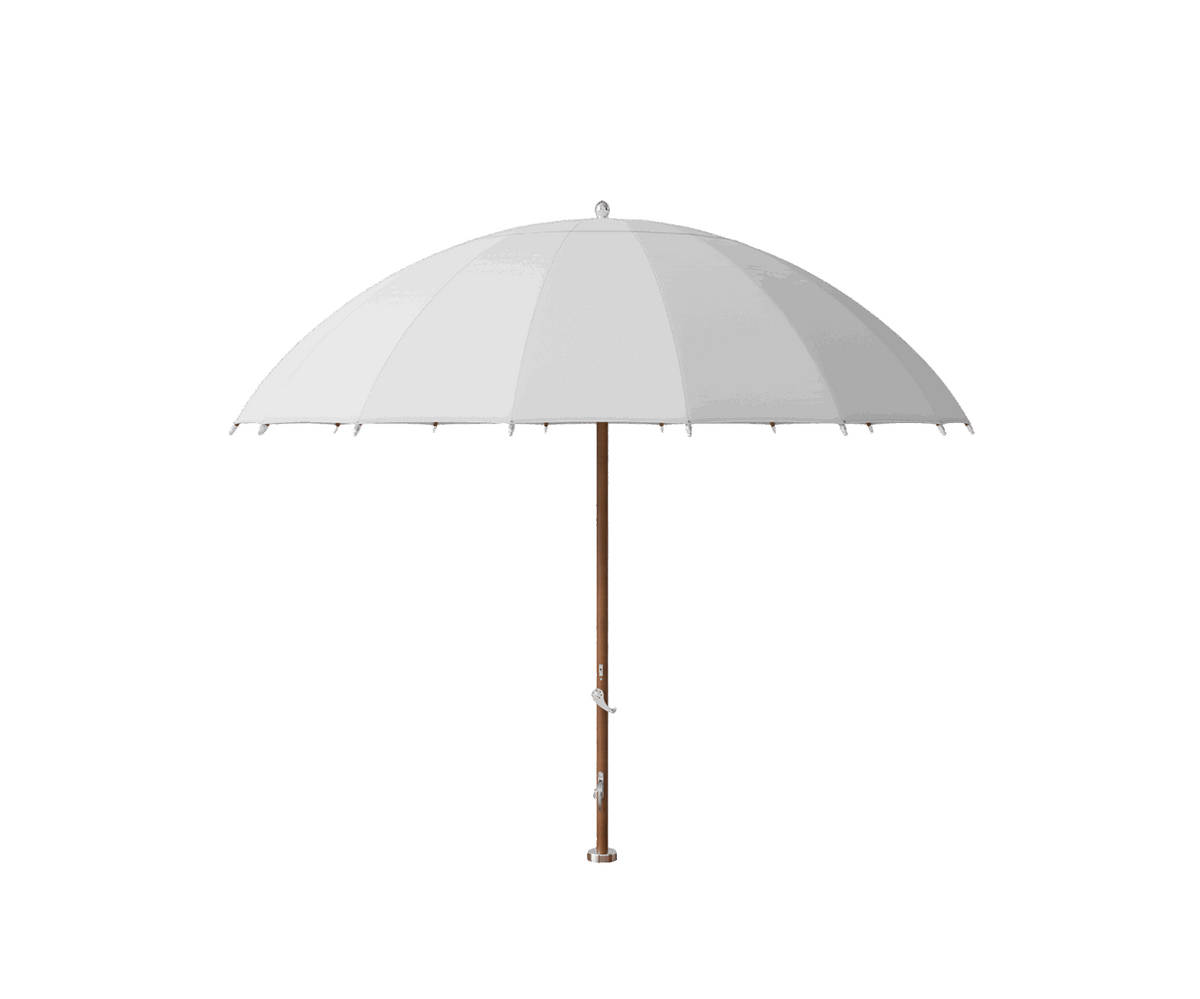 Modern outdoor Bolero parasol by Tuuci featuring curved ribs and titanium mast – Casa Design Group