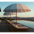 Modern outdoor Bolero parasol by Tuuci featuring curved ribs and titanium mast – Casa Design Group