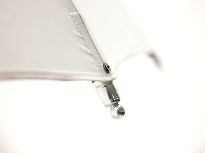 Modern outdoor Bolero parasol by Tuuci featuring curved ribs and titanium mast – Casa Design Group