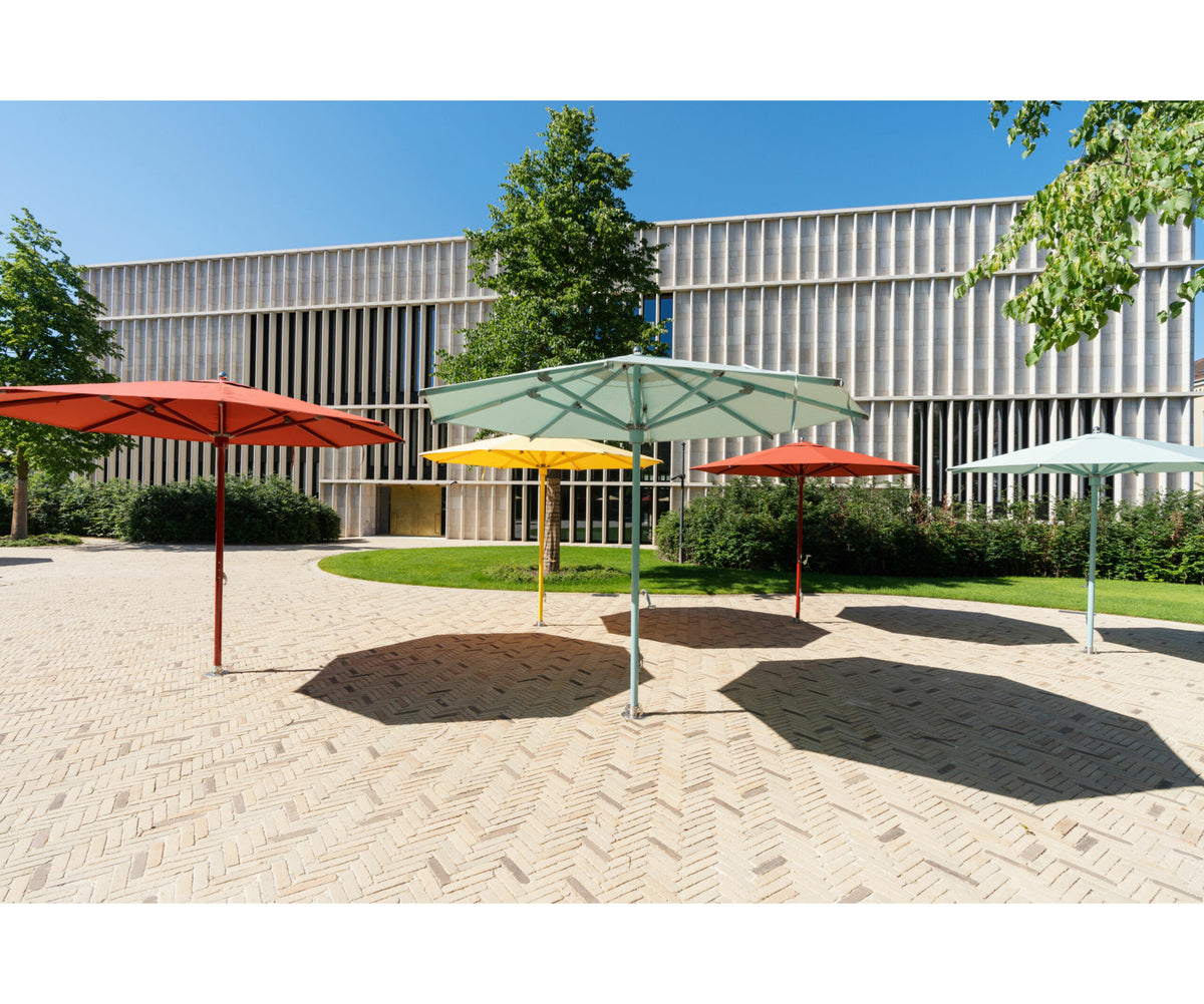 Elegant outdoor umbrella by Tuuci, durable and designed for beachfront properties | Casa Design Group