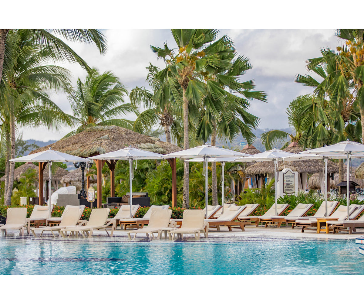 Elegant outdoor umbrella by Tuuci, durable and designed for beachfront properties | Casa Design Group