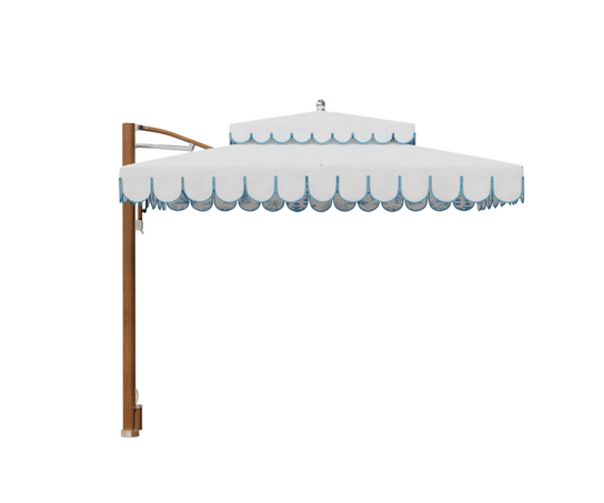Ocean Master MAX Cupola Cantilever square umbrella by Tuuci with a two-tier canopy and cantilever frame.