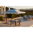 Ocean Master MAX Cupola Cantilever square umbrella by Tuuci with a two-tier canopy and cantilever frame.