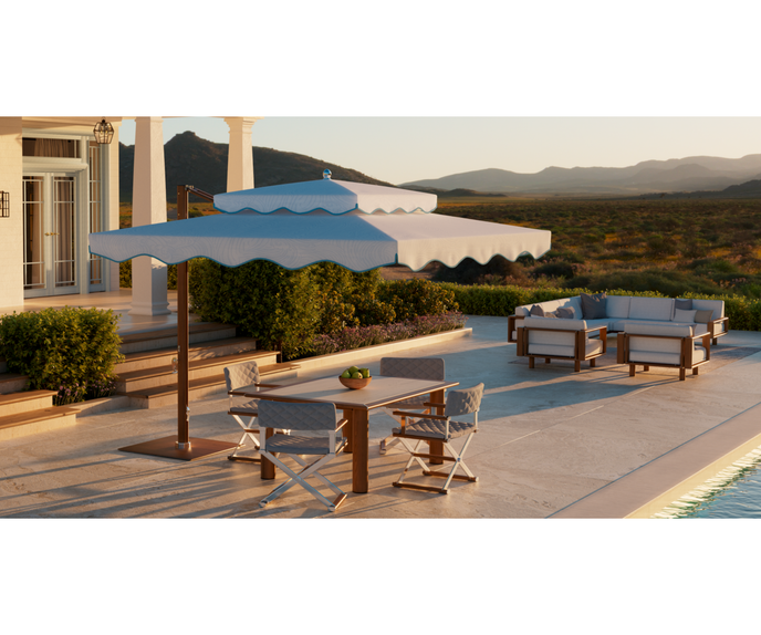 Ocean Master MAX Cupola Cantilever square umbrella by Tuuci with a two-tier canopy and cantilever frame.
