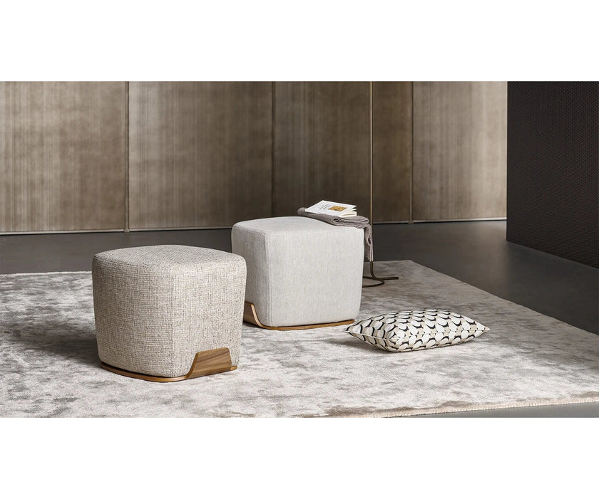 Olos elegant upholstered pouf by Mauro Lipparini | Casa Design Group