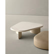 Onda High Coffee Table by Alexandra with an organic lacquered top and sculptural steel bases.