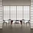 Ori Dining Chair with curved solid wood backrest, integrated armrests and woven cord or upholstered seat by Rimadesio | Casa Design Group