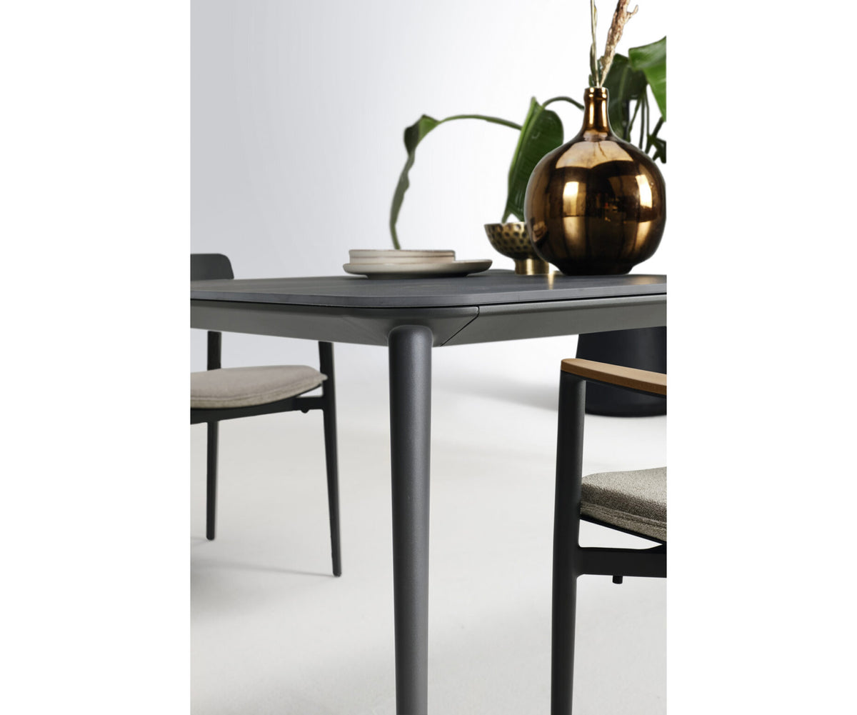 Modern Origami Outdoor Dining Table with Gres Top Casa Design Group
