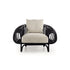 Pan Lounge Chair by Frigerio with handcrafted black reed frame and plush upholstered cushions for luxury interiors.