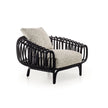 Pan Lounge Chair by Frigerio with handcrafted black reed frame and plush upholstered cushions for luxury interiors.
