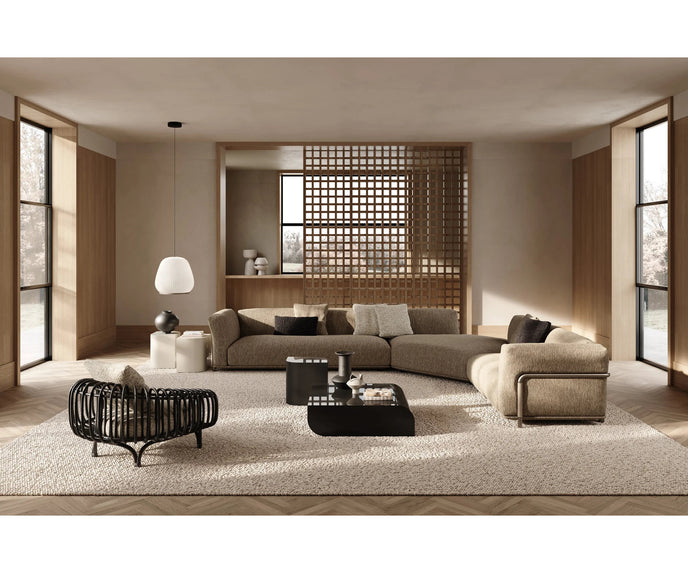 Pan Lounge Chair by Frigerio with handcrafted black reed frame and plush upholstered cushions for luxury interiors.