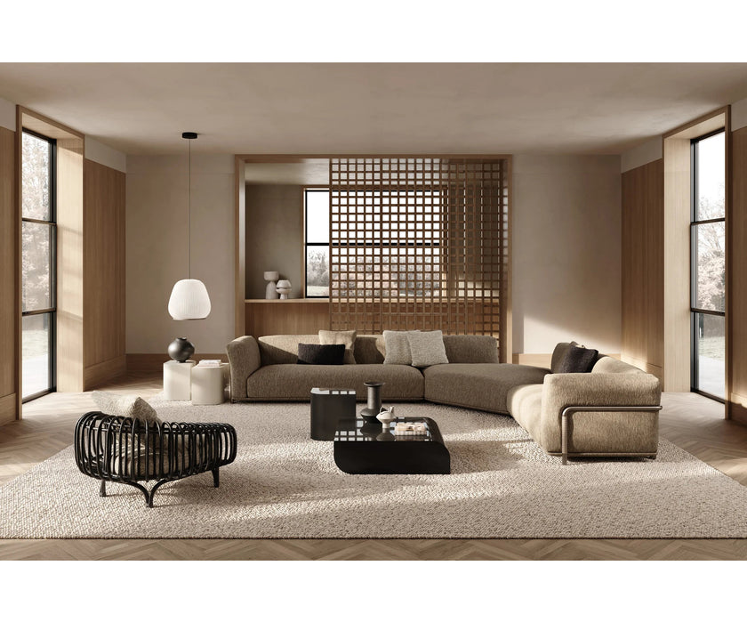 Pan Lounge Chair by Frigerio with handcrafted black reed frame and plush upholstered cushions for luxury interiors.
