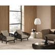 Pan Lounge Chair by Frigerio with handcrafted black reed frame and plush upholstered cushions for luxury interiors.