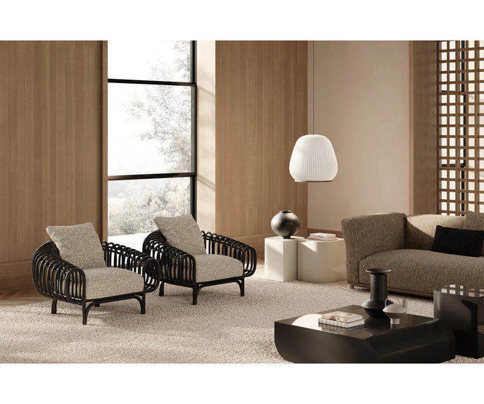 Pan Lounge Chair by Frigerio with handcrafted black reed frame and plush upholstered cushions for luxury interiors.