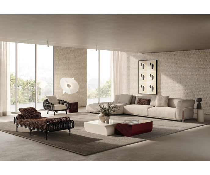 Pan Lounge Chair by Frigerio with handcrafted black reed frame and plush upholstered cushions for luxury interiors.