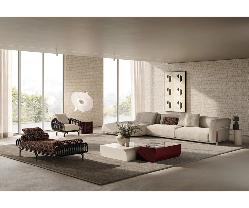 Pan Lounge Chair by Frigerio with handcrafted black reed frame and plush upholstered cushions for luxury interiors.