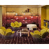 Peacock Lounge Chair by Cassina with a polished stainless steel mesh frame and seven upholstered cushions.