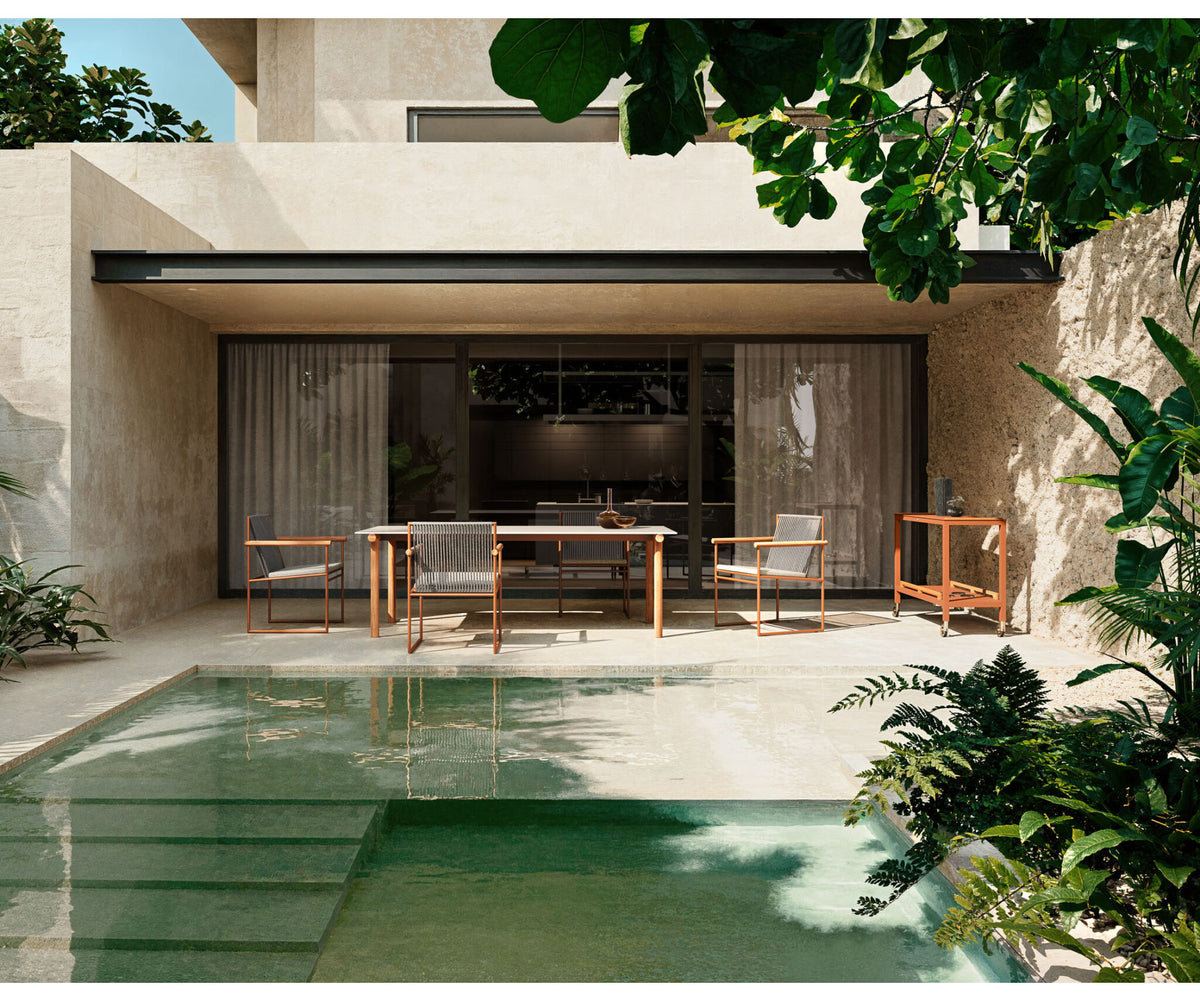 Modern Pipe Outdoor Dining Table with Gres Top Casa Design Group