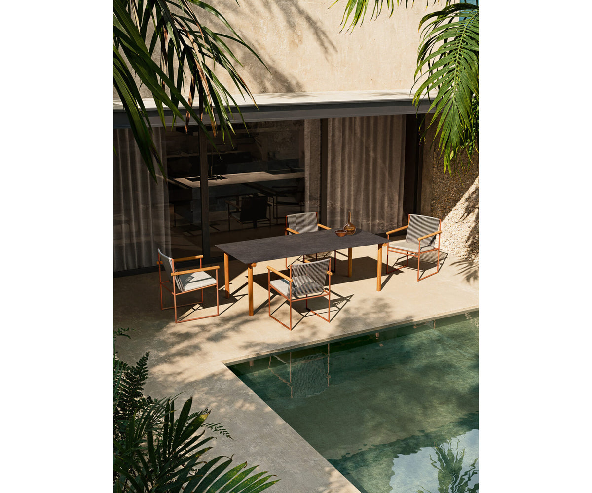 Modern Pipe Outdoor Dining Table with Gres Top Casa Design Group