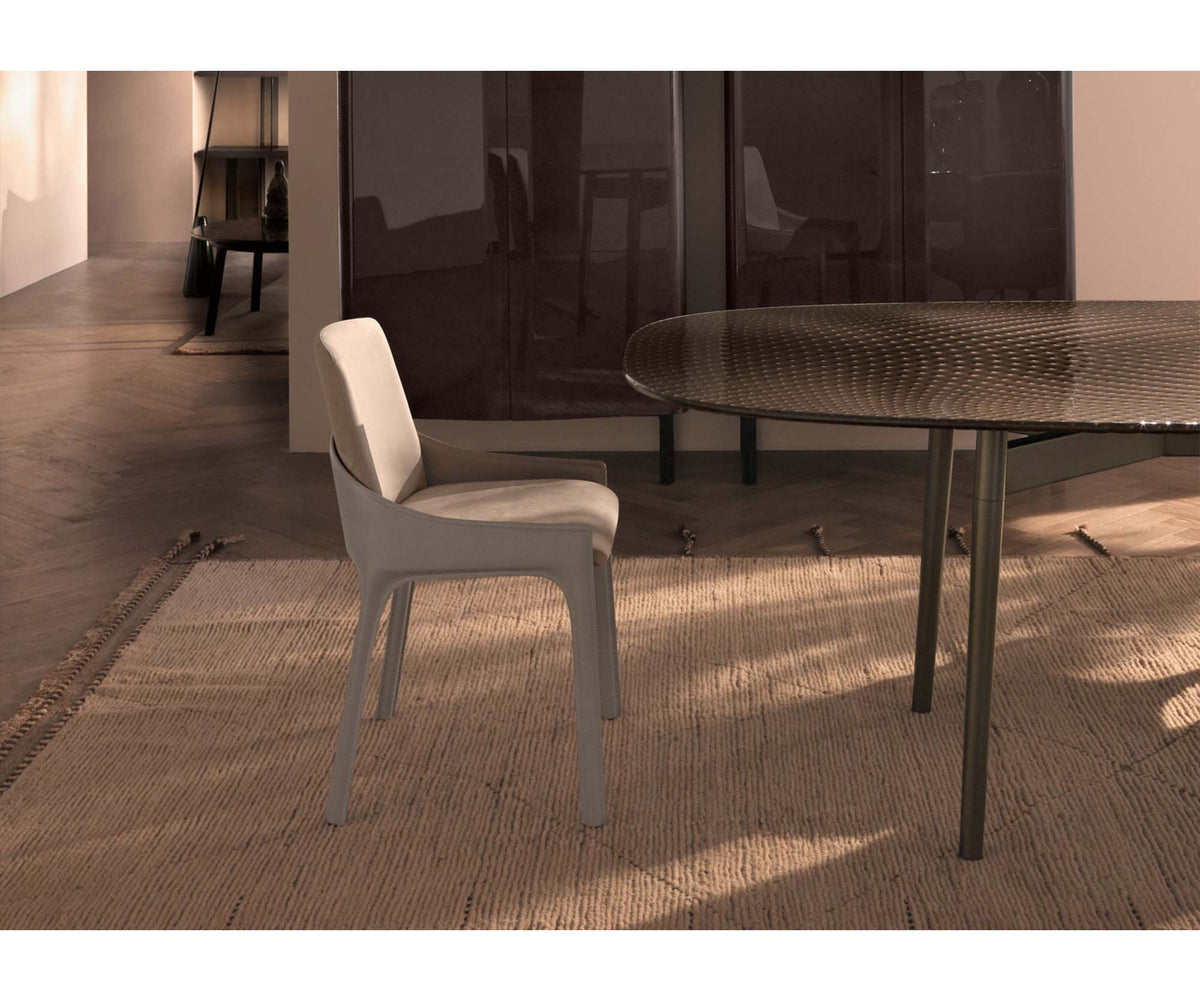 Plié dining chair by Fiam upholstered in hide leather or nubuck with metal and wood structure – Casa Design Group