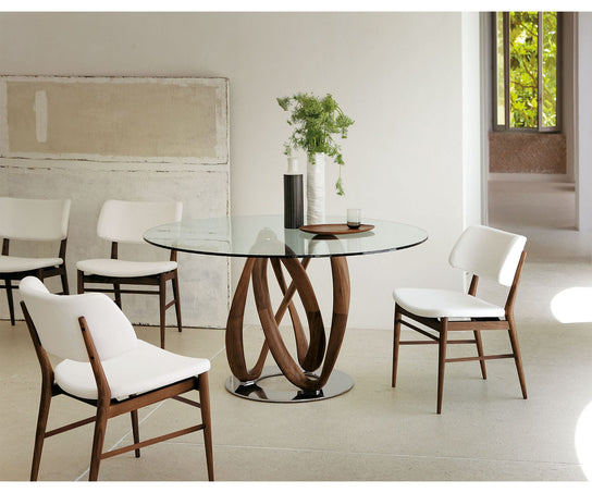Porada Nissa Side Chair with a solid Canaletta walnut frame and fabric or leather upholstery | Casa Design Group